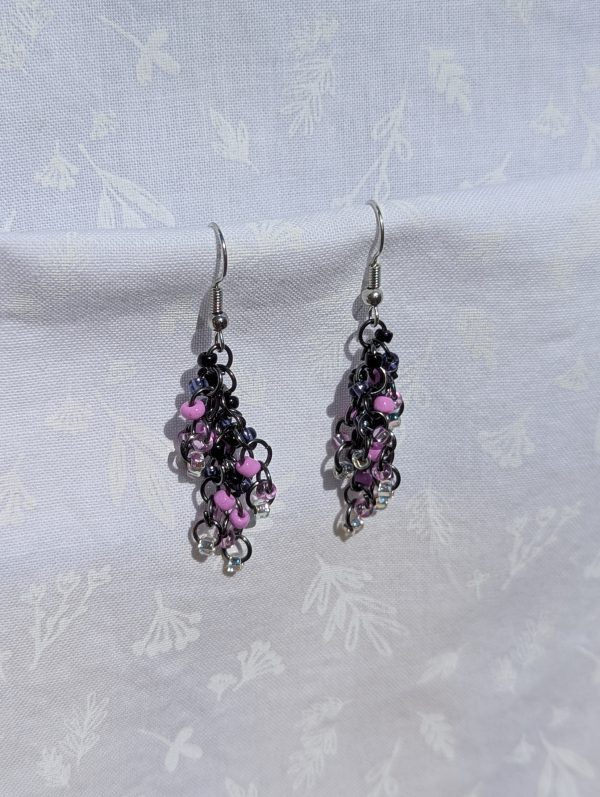 Midnight lavender earrings are Elegant black, lavender and clear beaded handmade earrings with dark jump rings.