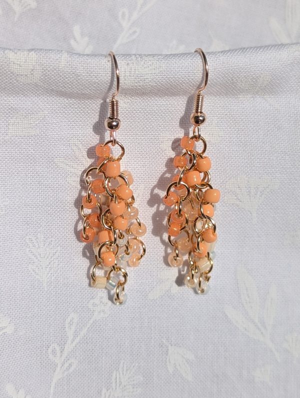 Peach Parfait: Handmade earrings with 30 glass beads in peach and cream tones, connected with rose-gold jump rings and hooks.