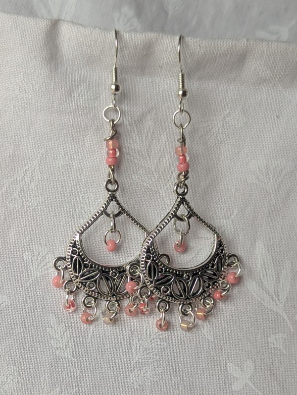 Soft Blossom chandelier earrings with Tibetan ornament, featuring 11 beads in pale pink and cream hues.