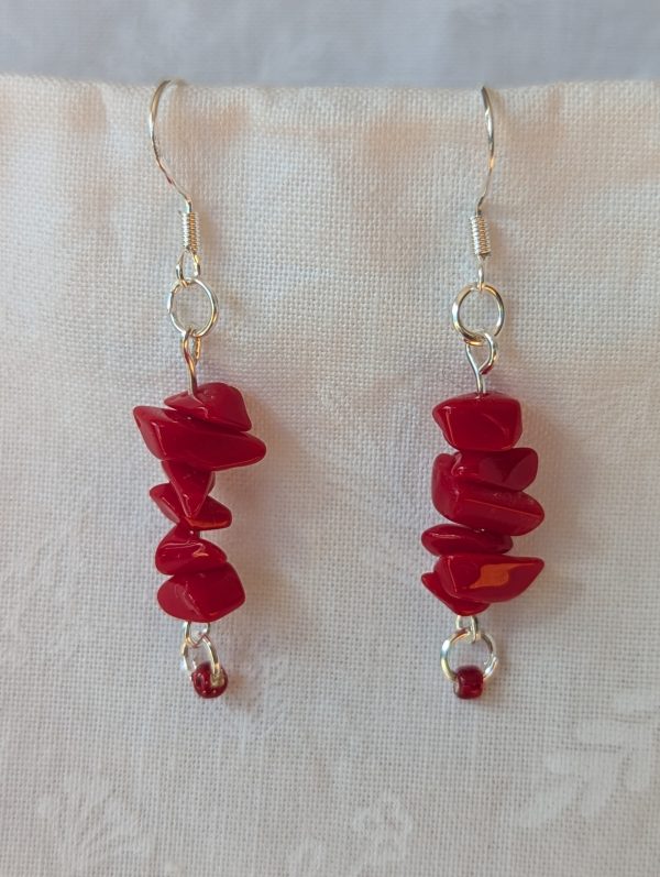 Handmade scarlet stone cascade earrings with red gemstone chips and small glass seed beads on sterling silver hooks.