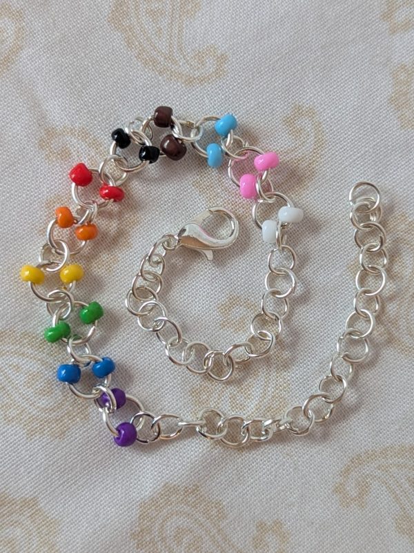 Unity Spectrum Chain bracelet with silver chain, rainbow pride flag, BLM, and trans flag seed bead colors, lobster clasp