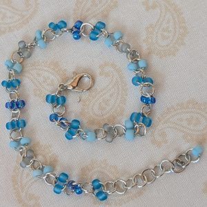 Tidal Mist Blue gradient bracelet with silver chain and paired glass seed beads in blue-gray and sky blue tones
